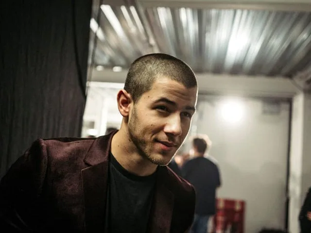 Nick Jonas Faces Backlash Over Playful Exchange with Elon Musk on X Platform